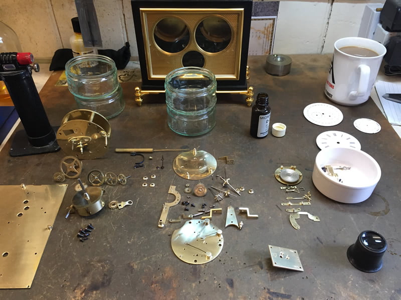 Elkington clock parts after restoration